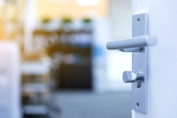 istock Opened door with metal lock and door handle 1496045173
