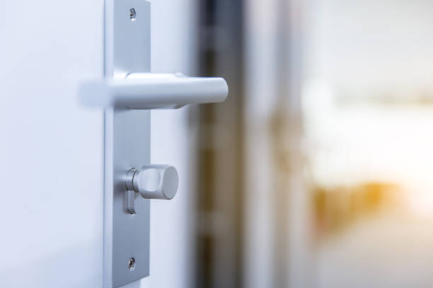 istock Opened door with metal lock and door handle 1496045179