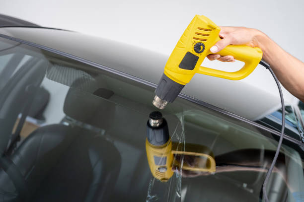 istock Car front window film removal and tinting installation 1496045415