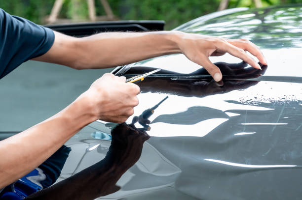 istock Car side window film removal and tinting installation 1496045465