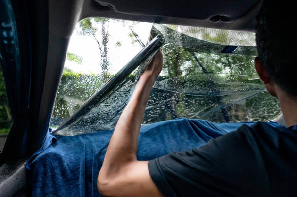istock Car side window film removal and tinting installation 1496045484