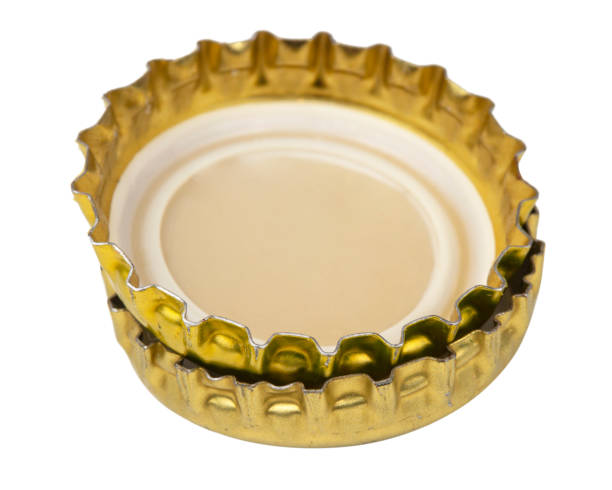 istock Crown cap bottle gold silver metal isolated on the white clipping path 1496050407