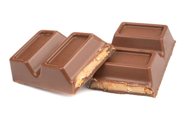 istock Chocolate bar blocks pieces isolated on the white. clipping path 1496051831