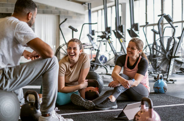 istock Small Group of People Exercising at a Gym 1496054706
