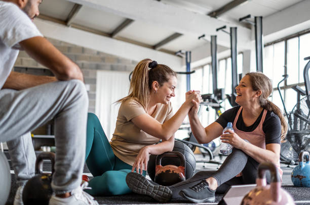 istock Small Group of People Exercising at a Gym 1496054713