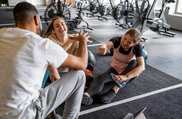 istock Small Group of People Exercising at a Gym 1496054722