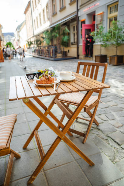 istock Served on the cafe's summer terrace with croissants and coffee 1496059209