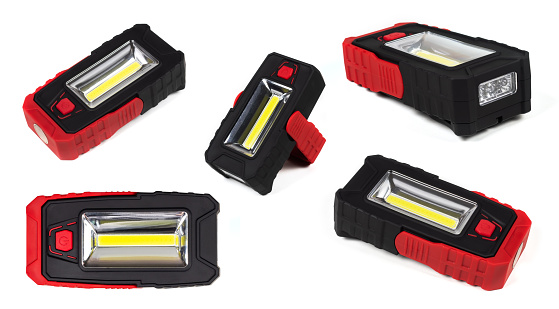 A set of several pocket portable flashlights from different angles view from the left, right, front, back, side without shadow close-up isolated on a white background