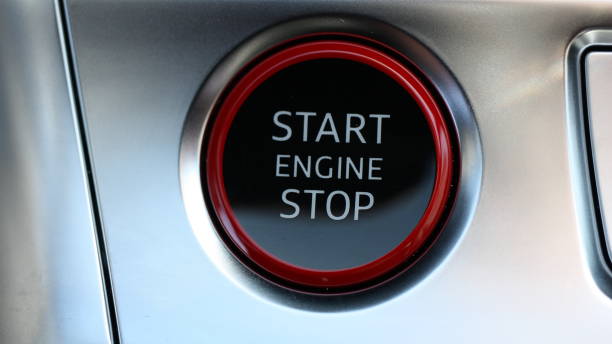 istock Extreme close-up of a sport car engine start and stop button 1496068011