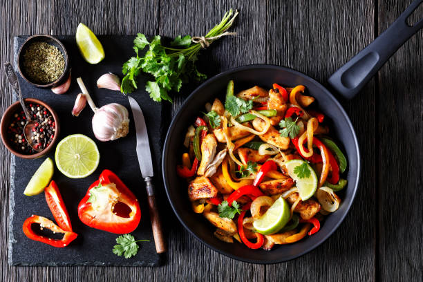 istock chicken fajitas with bell peppers, onion, spices 1496068027