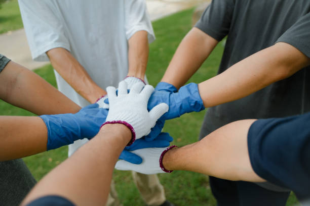 istock world environment day Global Community Teamwork CSR and ESG Environmental Energy Saving Cooperation Clean Collaboration for the Sustainable Development Goals People ask for cooperation. 1496070262