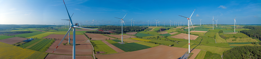 Image over a large wind farm for green energy production in Germany