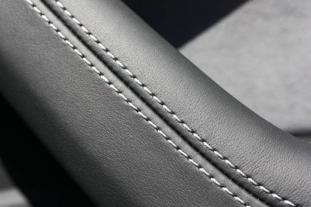 istock Black leather interior car door handle with contrast stitches of gray (Jet gray exclusive color) thread 1496089456