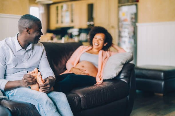 istock Husband massaging his wife's feet 1496089980