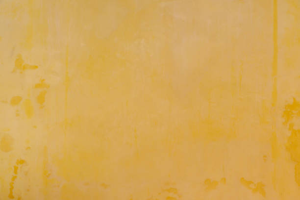 istock Yellow wall concrete texture, Cement vintage wallpaper background 1496095664