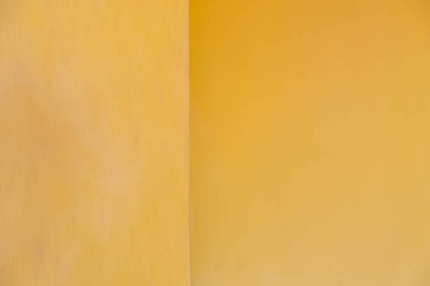 istock Yellow wall concrete texture, Cement vintage wallpaper background 1496095676