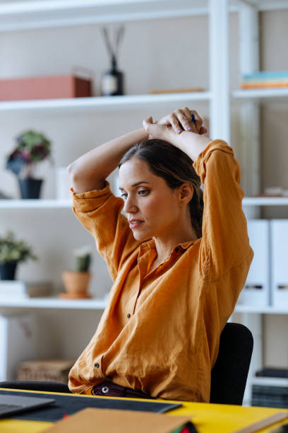 istock A Serious Beautiful Businesswoman Working In The Office 1496098076