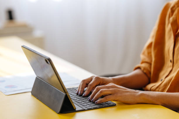 istock An Unrecognizable Businesswoman Working In The Office On Her Tablet 1496098321