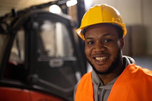 istock Portrait of a young worker in a warehouse 1496100478
