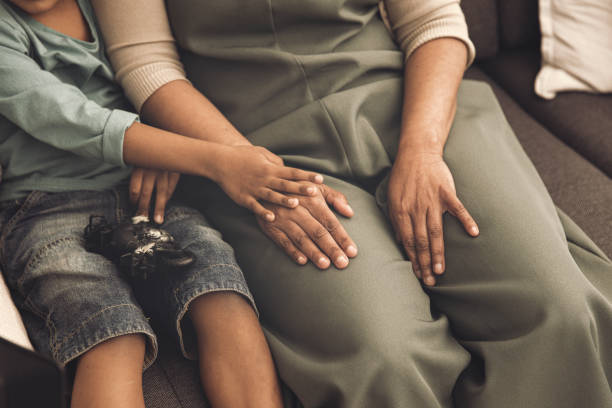 istock A young kid is comforting his mother 1496100819