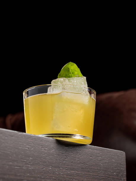 istock Luxury cocktail on the wooden table on a dark background 1496101495
