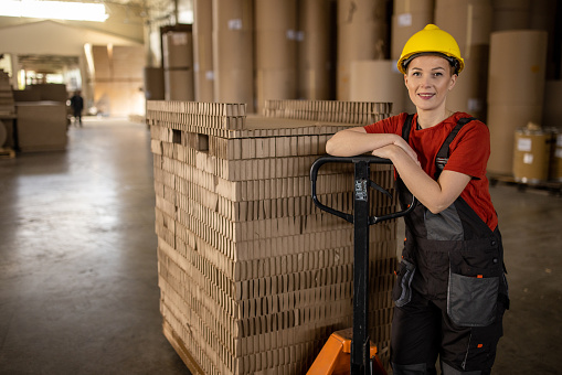 Portrait of a mid adult Caucasian female warehouse worker