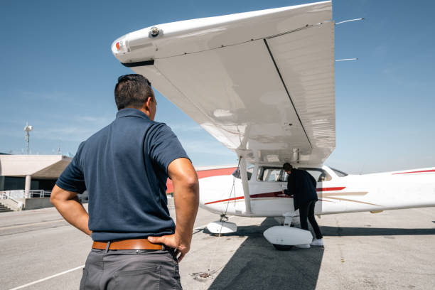 istock A young pilot student is checking out his aircraft before the training session 1496102123