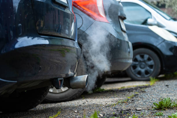istock Smoke coming out of a car exhaust pipe 1496105755