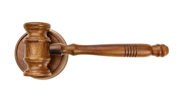 istock A wooden judge gavel isolated on white background 1496108922