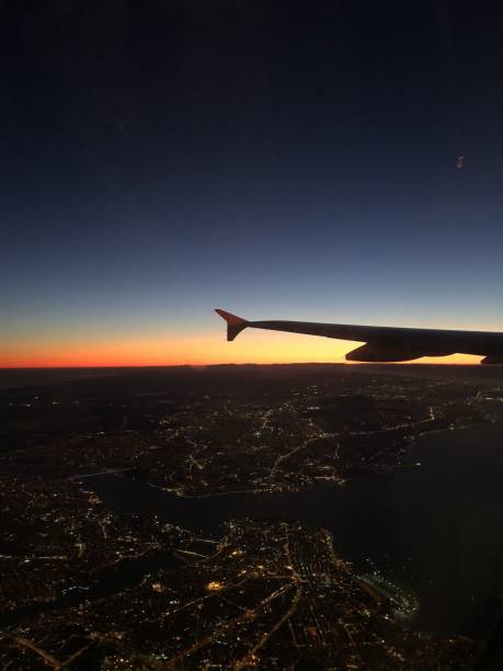 istock fly, fly journey, world, sunrise, bird's eye view, window side aeroplane 1496109013