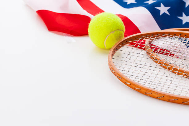 istock American flag with tennis rackets. 1496110891