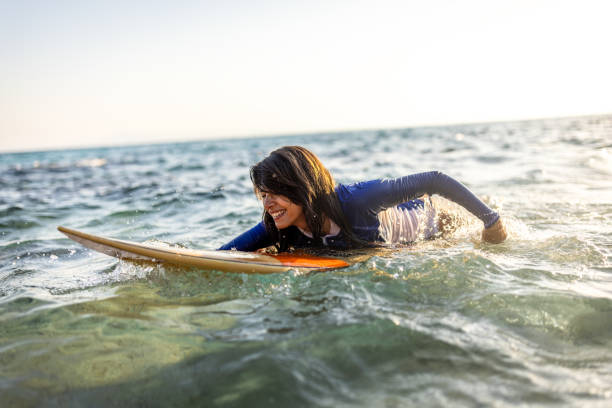 istock Portrait of smiling surfer 1496110990