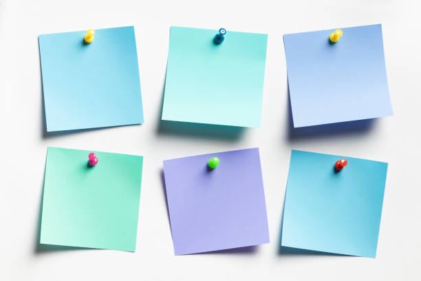istock Group of blue Sticky notes on white paper background 1496111748
