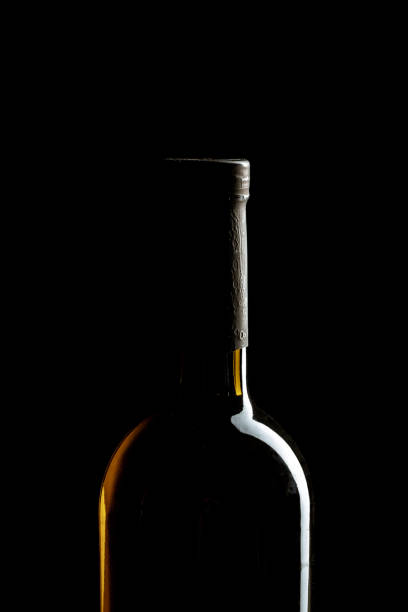 istock Wine bottle on a dark black background 1496115774