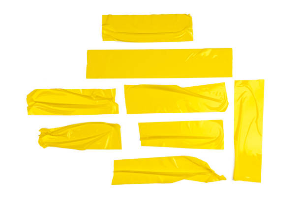istock Set of yellow tapes on white background 1496116892