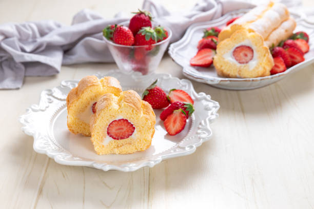 istock Cake roll with strawberries and cream cheese 1496117305