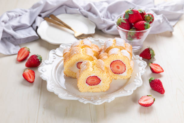 istock Cake roll with strawberries and cream cheese 1496117320