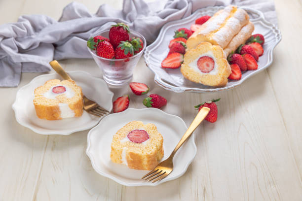 istock Cake roll with strawberries and cream cheese 1496117331