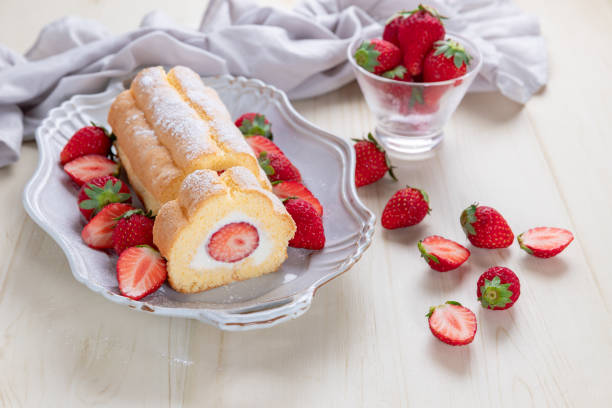 istock Cake roll with strawberries and cream cheese 1496117358