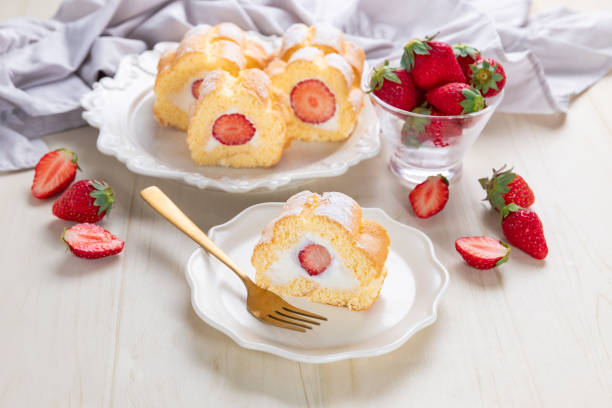 istock Cake roll with strawberries and cream cheese 1496117359