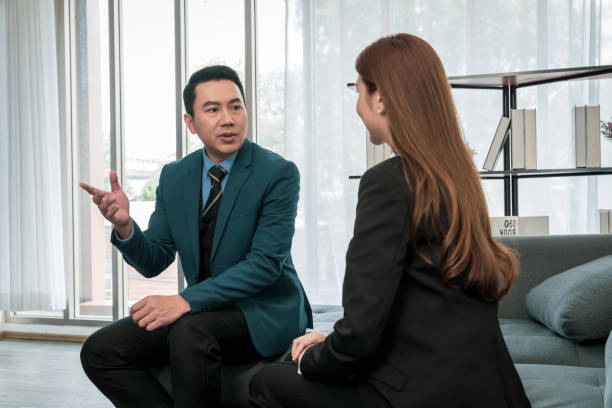 istock Modern Asian businessman with high confidence Committed to working together as a harmonious team Having a professional planning meeting at the company 1496117702
