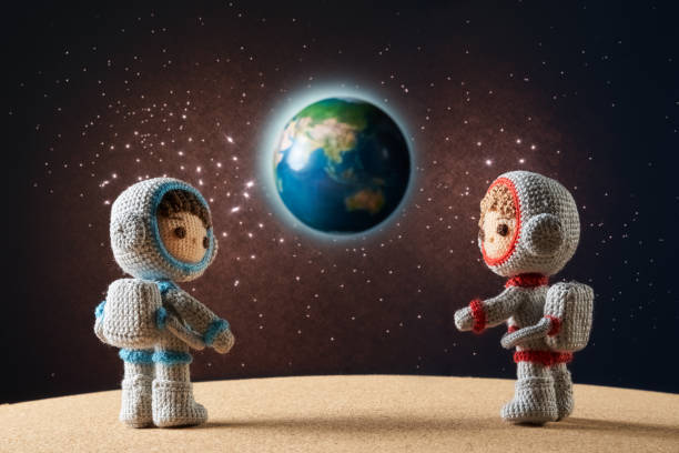 istock Small and cute Amigurumi doll .　astronaut in outer space 1496118030