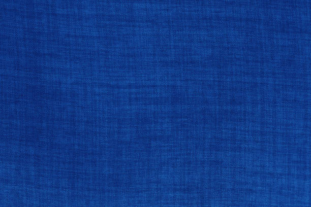 istock Dark blue linen fabric cloth texture for background, natural textile pattern. 1496119909