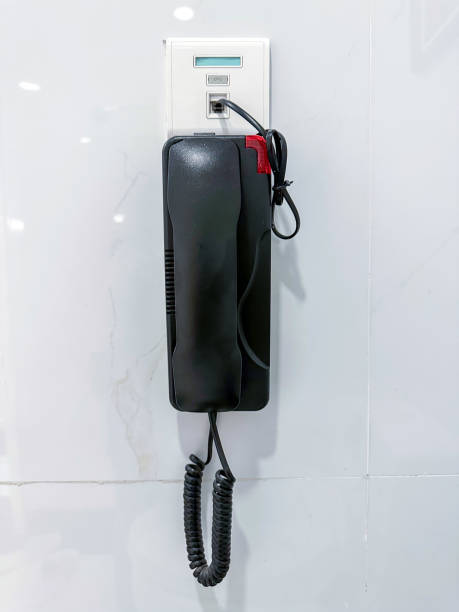 istock Black telephone with LAN cable for telecomunication 1496124105