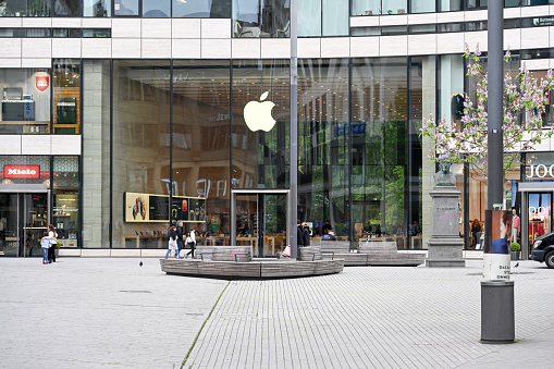 Chengdu/China-Feb.2020: Apple stores in Chunxi Road in Chengdu,China have reopened after new type coronavirus pneumonia in Wuhan is a slight improvement. So many people playing outside the apple store on the Chunxi Road in Chengdu,China,which is Chengdu's most famous shopping street and has numerous stores for shopping.