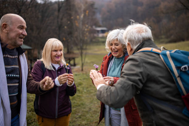 istock Happy mature couples in nature 1496127232