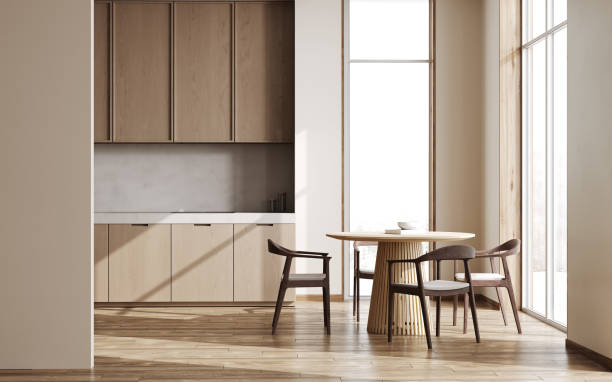istock Modern light kitchen interior with dining area near window, wooden concept, 3d rendering 1496129737
