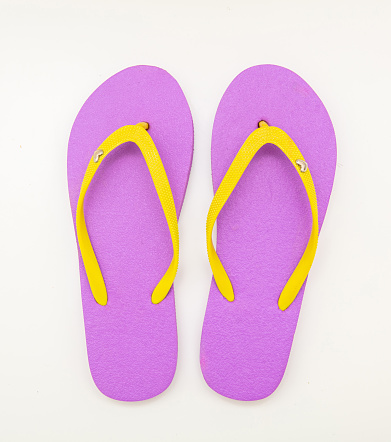 Flip flops isolated on transparent. Summer vacation beach footwear, top view.