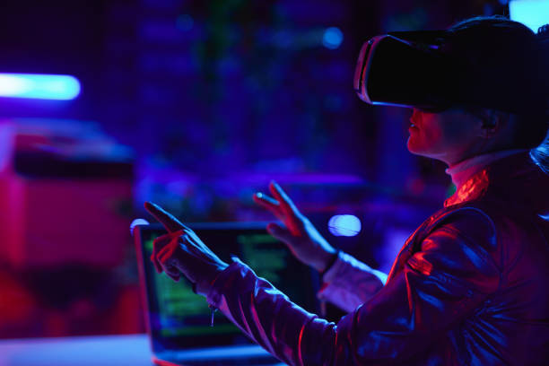 istock Seen from behind business woman designing virtual reality 1496130260