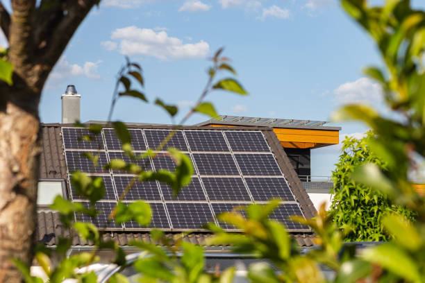 solar panel rooftop on building roof stock photo